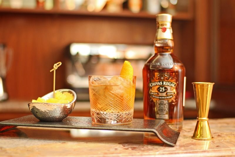 فندق أوريون بيشكيك المظهر الخارجي الصورة A bottle of 25 year old Chivas Regal