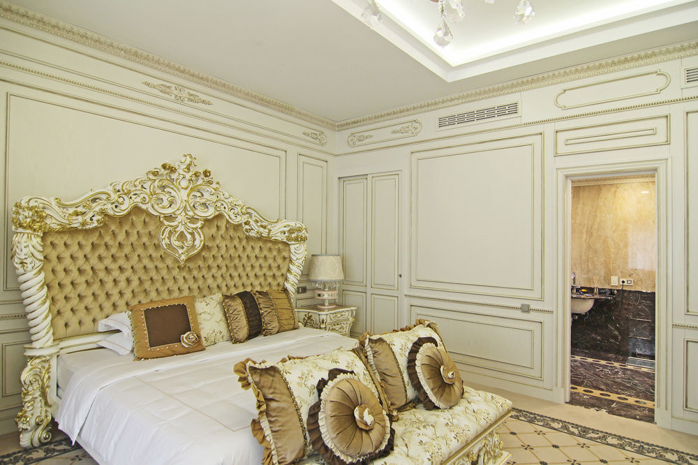 فندق أوريون بيشكيك المظهر الخارجي الصورة A bedroom in the hotel